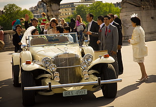 classic beige car and men's gray suit, weddings, Paris, Excalibur, Oldtimer