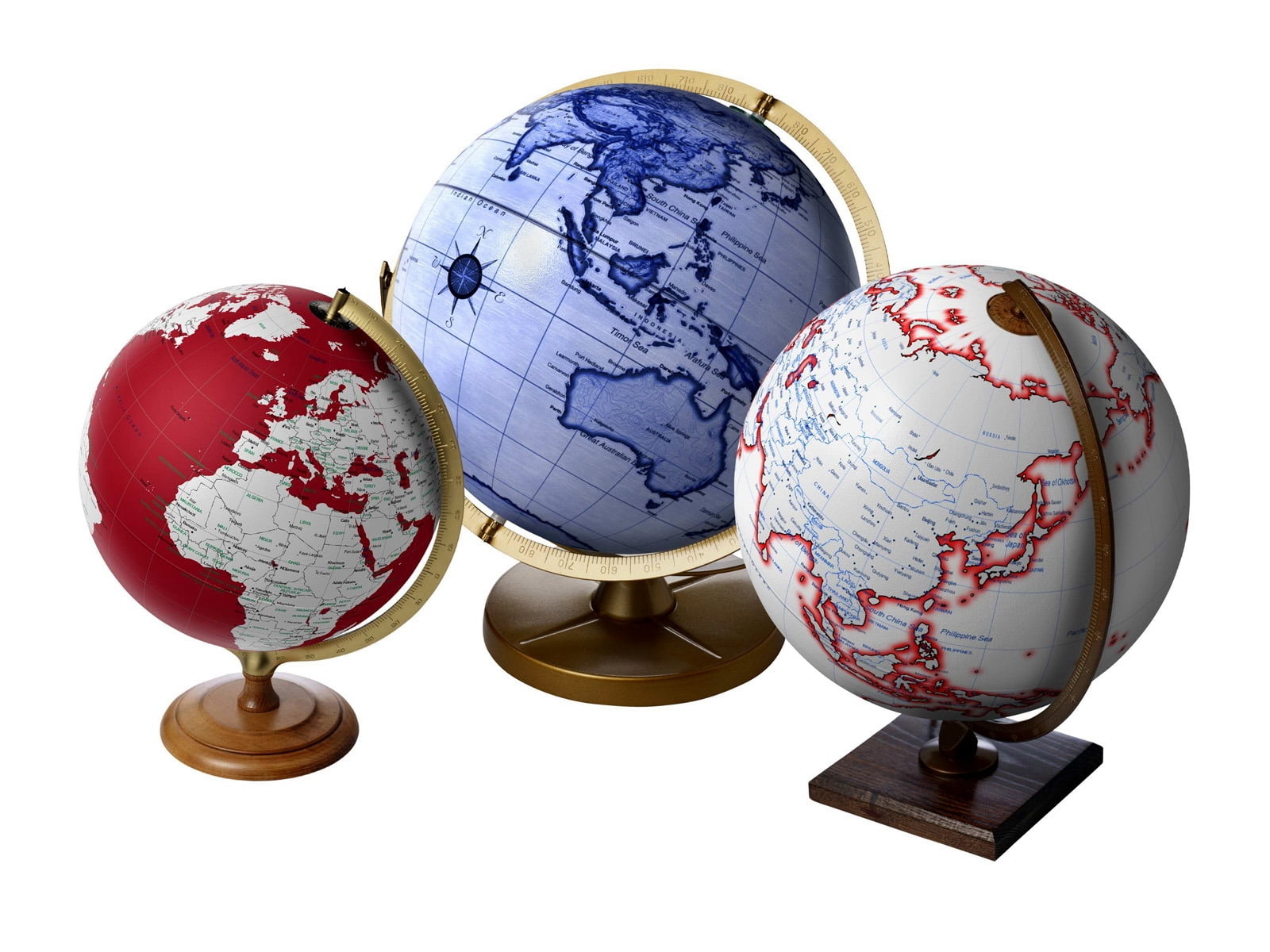 two red and one blue desk globes