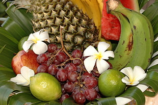 grapes, limes, pineapple and bananas