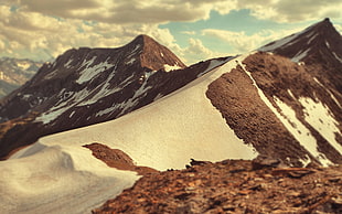 closeup photo of mountain top with snow