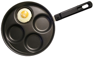 black egg fryer with one fried egg
