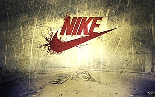 red Nike logo on wall