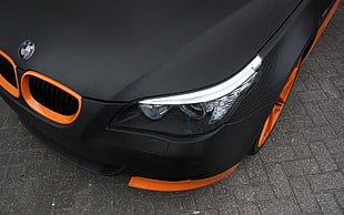 black and orange BMW 5 series