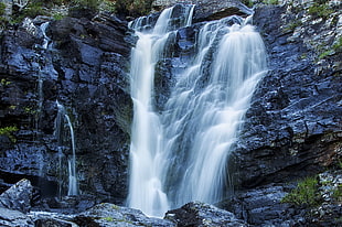 tipelapse photo of waterfalls during daytime, highlands, scotland