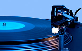vinyl record on black vinyl player