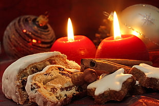 close-up photo of bread near candles