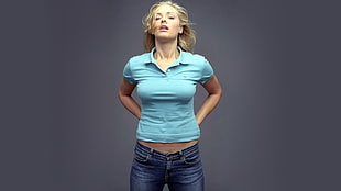 woman in blue polo shirt HD wallpaper