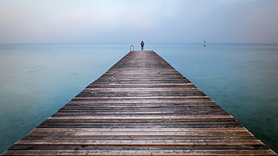 person standing on wooden dock during daytime, garda lake, sirmione, italy HD wallpaper