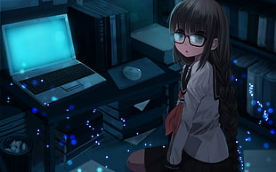 girl in gray clothes in front of laptop computer