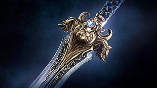 closeup photo of gold-colored sword