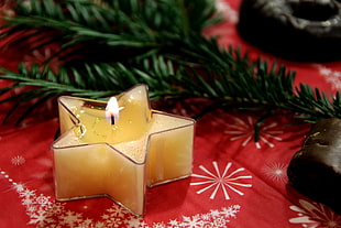 star-shaped cased lighted candle HD wallpaper