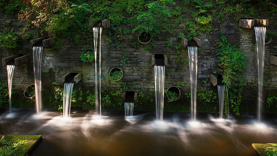 green leafed plants, fountain, wall HD wallpaper
