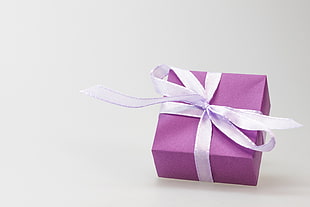 purple box with ribbon