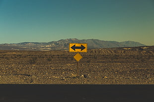 black and yellow arrow sign HD wallpaper