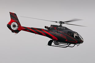black and red helicopter