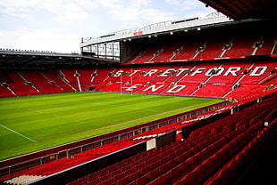 green and red Stretford End field