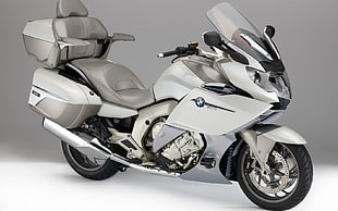 white BMW sports touring motorcycle