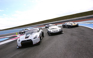 several sports cars, Nissan GT-R R35, Lamborghini Murcielago, Ford GT, Aston Martin Vanquish