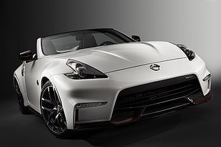 white Nissan convertible coupe