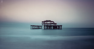 landscape photography of building structure on body of water, brighton