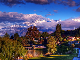 village house beside  body of water near snow covered mountain, wanaka HD wallpaper