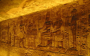 Egyptian god and goddess carved on stone, Egypt, Gods of Egypt, gold