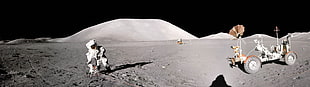 astronaut on gray surface during nighttime