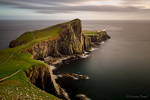 white concrete lighthouse at green land near body of water, neist point HD wallpaper