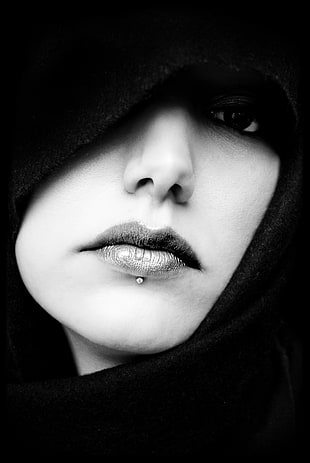 grayscale photography of woman with piercing