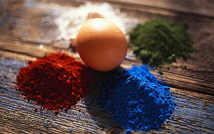 brown egg,red,blue,and green powders