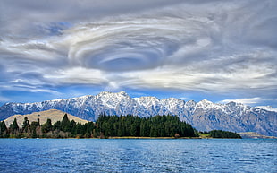 cloud storm formation near island and mountains, queenstown