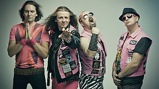 4-man band wears pink shirts
