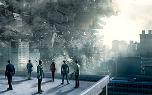 people standing on top of building near buildings falling digital wallpaper