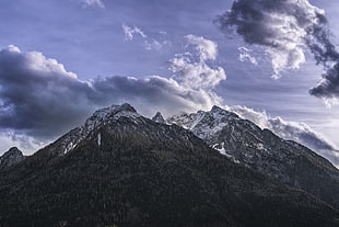 snowy mountain with clouds in the background HD wallpaper