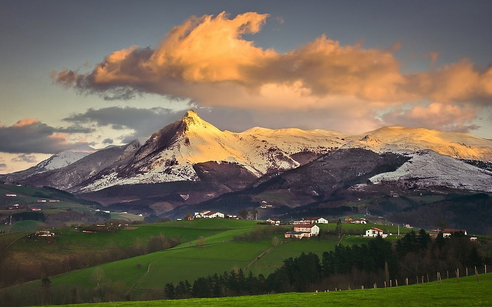 rocky mountains with snow during day time HD wallpaper