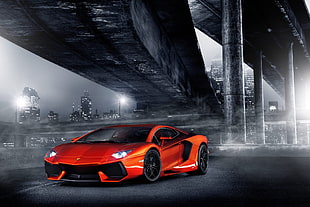 selective color photo of red Lamborghini sports coupe under the bridge