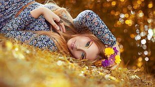woman lying on grass field during daytime HD wallpaper