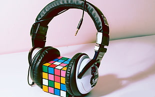 4x4 Rubik's cube between headphones