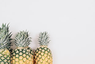 three ripe pineapples HD wallpaper