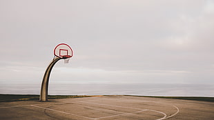 white, red, and brown basketball hoop