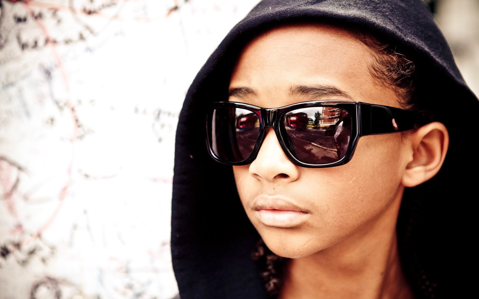 kid on black wayferer sunglasses on black hoodie jacket