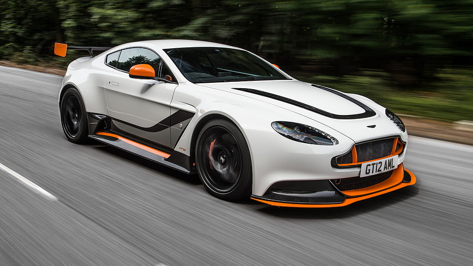 timelapse photography of white and orange Aston Martin coupe HD wallpaper