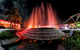 outdoor fountain during nighttime HD wallpaper