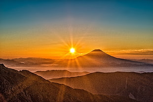 sunrise photo on mountain range HD wallpaper