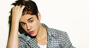 Justin Beiber wearing gray and black plaid flannel