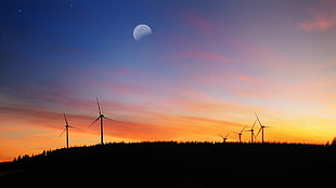silhouette of windmills, landscape, sunset