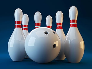 six white-and-red bowling pins and ball