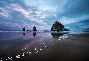 brown sand seashore, beach, rocks, clouds