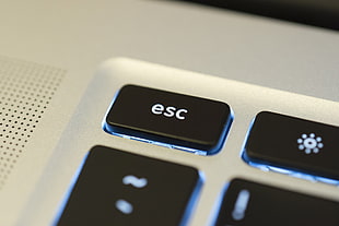 gray and black esc LED keyboard button