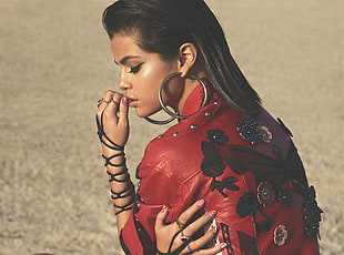 Selena Gomez on gray background